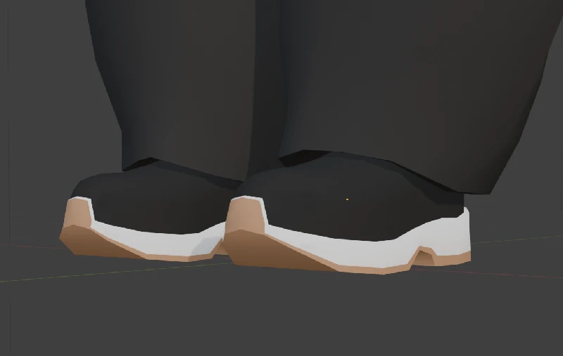 A close-up of Laura's new sneakers, with orange colour added to the bottoms.
